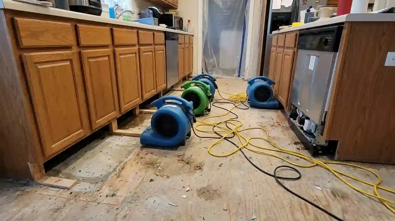 Drying under kitchen cabinets after a dishwasher leak